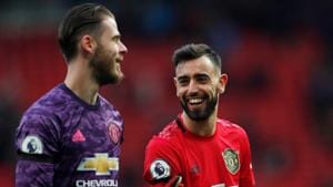 Manchester United's Bruno Fernandes celebrates with David de Gea after the match.(Action Images via Reuters) Manchester United's Bruno Fernandes celebrates with David de Gea after the match.(Action Images via Reuters)