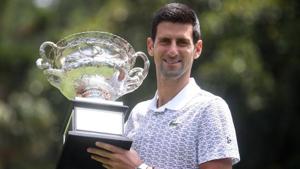 Australian Open champion Serbia's Novak Djokovic poses with the trophy.(REUTERS) Australian Open champion Serbia's Novak Djokovic poses with the trophy.(REUTERS)