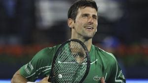Dubai: Serbia's Novak Djokovic celebrates after he beats Tunisia's Malek Jaziri.(AP)