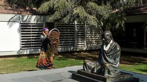 A labourer pours a bucket of soil near the statue of Mahatma Gandhi (R) at Sabarmati Ashram also known as Gandhi Ashram in Ahmedabad.(AFP) A labourer pours a bucket of soil near the statue of Mahatma Gandhi (R) at Sabarmati Ashram also known as Gandhi Ashram in Ahmedabad.(AFP)