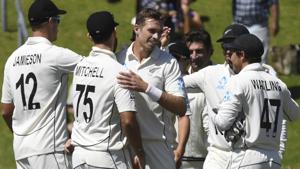 New Zealand's Tim Southee, is congratulated by teamates after taking the final wicket of India's Jasprit Bumrah.(AP) New Zealand's Tim Southee, is congratulated by teamates after taking the final wicket of India's Jasprit Bumrah.(AP)
