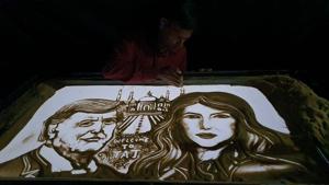 Sand animator Manas Kumar has created an art piece in which Donald Trump and Melania are seen in front of the Taj Mahal.(Facebook/Manas Kumar Sahoo) Sand animator Manas Kumar has created an art piece in which Donald Trump and Melania are seen in front of the Taj Mahal.(Facebook/Manas Kumar Sahoo)
