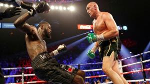 Tyson Fury knocks down Deontay Wilder during the fight.(REUTERS) Tyson Fury knocks down Deontay Wilder during the fight.(REUTERS)