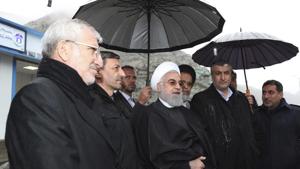 President Hassan Rouhani, center, sought to reassure the nation in a speech on Tuesday (Feb 25th, 2020), calling the new coronavirus an "uninvited and inauspicious passenger." "We will get through corona," Rouhani said. "We will get through the virus."(AP) President Hassan Rouhani, center, sought to reassure the nation in a speech on Tuesday (Feb 25th, 2020), calling the new coronavirus an "uninvited and inauspicious passenger." "We will get through corona," Rouhani said. "We will get through the virus."(AP)
