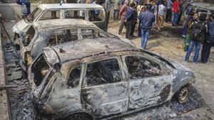 The vehicles which were set ablaze by rioters in Northeast Delhi on Wednesday.(PTI Photo) The vehicles which were set ablaze by rioters in Northeast Delhi on Wednesday.(PTI Photo)