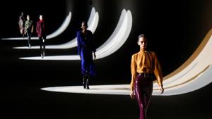 Models present creations by designer Anthony Vaccarello as part of his Fall/Winter 2020/21 women's ready-to-wear collection show for fashion house Saint Laurent during Paris Fashion Week in Paris, France.(REUTERS)