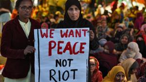 Protesters take part in a sit-in in New Delhi against the violence in Northeast district on Wednesday.(Burhaan Kinu/HT Photo) Protesters take part in a sit-in in New Delhi against the violence in Northeast district on Wednesday.(Burhaan Kinu/HT Photo)