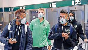 Bulgarian team Ludogorets players arrive at the Milan airport to play their Europa League in an empty stadium against Inter Milan(AP) Bulgarian team Ludogorets players arrive at the Milan airport to play their Europa League in an empty stadium against Inter Milan(AP)