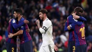 FILE PHOTO: Soccer Football - La Liga Santander - Real Madrid v FC Barcelona - Santiago Bernabeu, Madrid, Spain - March 2, 2019 FC Barcelona's Lionel Messi, Luis Suarez and Gerard Pique celebrate victory as Real Madrid's Sergio Ramos walks off REUTERS/Sergio Perez(REUTERS) FILE PHOTO: Soccer Football - La Liga Santander - Real Madrid v FC Barcelona - Santiago Bernabeu, Madrid, Spain - March 2, 2019 FC Barcelona's Lionel Messi, Luis Suarez and Gerard Pique celebrate victory as Real Madrid's Sergio Ramos walks off REUTERS/Sergio Perez(REUTERS)