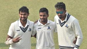 Kolkata: Bengal skipper Abhimanyu Easwaran flanked by his two teammates Abhishek Kumar Raman and Ishan Porel(PTI)