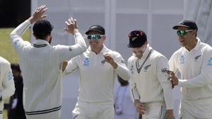 New Zealand's Tom Latham, centre, is congratulated by teammates after taking catch to dismiss India's Prithvi Shaw.(AP) New Zealand's Tom Latham, centre, is congratulated by teammates after taking catch to dismiss India's Prithvi Shaw.(AP)