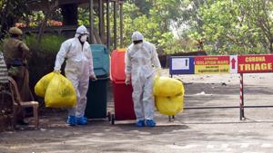 Medical staff in a protective suit exiting the Special Isolation Ward set up to provide treatment to novel coronavirus patients at Kochi Medical college in Kerala.(ANI Photo) Medical staff in a protective suit exiting the Special Isolation Ward set up to provide treatment to novel coronavirus patients at Kochi Medical college in Kerala.(ANI Photo)
