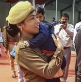 Police constable Priti Rani arrives on duty with her 18-month-old son during UP Chief Minister Yogi Adityanath's event, in Noida.(PTI) Police constable Priti Rani arrives on duty with her 18-month-old son during UP Chief Minister Yogi Adityanath's event, in Noida.(PTI)