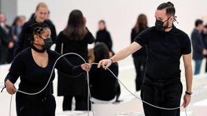 Staff wear masks ahead of designer Pierpaolo Piccioli's Fall/Winter 2020/21 women's ready-to-wear collection show for fashion house Valentino during Paris Fashion Week in Paris.(REUTERS) Staff wear masks ahead of designer Pierpaolo Piccioli's Fall/Winter 2020/21 women's ready-to-wear collection show for fashion house Valentino during Paris Fashion Week in Paris.(REUTERS)
