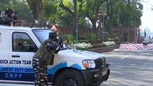 Security personnel takes position as BJP MP Vinod Sonkar’s car accidentally touched the boom barrier at Parliament entrance.(ANI Photo) Security personnel takes position as BJP MP Vinod Sonkar’s car accidentally touched the boom barrier at Parliament entrance.(ANI Photo)