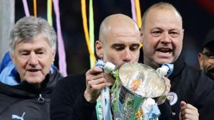 File image: Manchester City manager Pep Guardiola and the first team staff celebrate with the trophy after winning the Carabao Cup.(REUTERS) File image: Manchester City manager Pep Guardiola and the first team staff celebrate with the trophy after winning the Carabao Cup.(REUTERS)