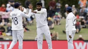 India's Jasprit Bumrah, centre, is congratulated by his captain Virat Kohli(AP) India's Jasprit Bumrah, centre, is congratulated by his captain Virat Kohli(AP)