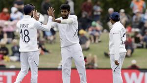 India's Jasprit Bumrah, centre, is congratulated by his captain Virat Kohli(AP) India's Jasprit Bumrah, centre, is congratulated by his captain Virat Kohli(AP)