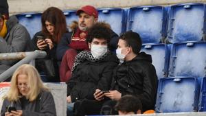 Coronavirus outbreak: AS Roma fans wearing face masks.(REUTERS) Coronavirus outbreak: AS Roma fans wearing face masks.(REUTERS)