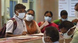 People wear protective masks at the government-run Gandhi Hospital in Hyderabad.(PTI PHOTO.) People wear protective masks at the government-run Gandhi Hospital in Hyderabad.(PTI PHOTO.)