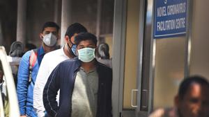 People wearing protective masks stand in a queue near novel coronavirus Facilitation Centre at Ram Manohar Lohia (RML) Hospital following positive cases of coronavirus in the country in New Delhi on Wednesday.(Raj K Raj/HT PHOTO) People wearing protective masks stand in a queue near novel coronavirus Facilitation Centre at Ram Manohar Lohia (RML) Hospital following positive cases of coronavirus in the country in New Delhi on Wednesday.(Raj K Raj/HT PHOTO)