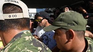 Brazilian ex-football star Ronaldinho Gaucho arrives at Silvio Pettirossi International Airport in Luque.(AFP) Brazilian ex-football star Ronaldinho Gaucho arrives at Silvio Pettirossi International Airport in Luque.(AFP)