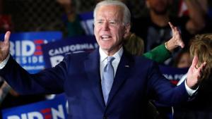 Democratic US presidential candidate and former Vice President Joe Biden addresses supporters at his Super Tuesday night rally in Los Angeles, California, March 3, 2020.(REUTERS) Democratic US presidential candidate and former Vice President Joe Biden addresses supporters at his Super Tuesday night rally in Los Angeles, California, March 3, 2020.(REUTERS)
