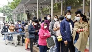 People wearing protective masks stand in a queue near novel coronavirus facilitation centre at Ram Manohar Lohia (RML) Hospital in Delhi on Thursday.(Sanjeev Verma/HT Photo) People wearing protective masks stand in a queue near novel coronavirus facilitation centre at Ram Manohar Lohia (RML) Hospital in Delhi on Thursday.(Sanjeev Verma/HT Photo)