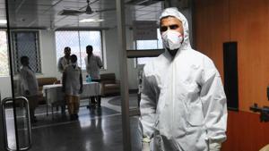 Medical staff with protective clothing seen inside a ward specialised in receiving any person who may have been infected with coronavirus, at Lok Nayak Jai Prakash Narayan (LNJP) Hospital, in New Delhi, India, on Thursday, March 5, 2020.(HT photo) Medical staff with protective clothing seen inside a ward specialised in receiving any person who may have been infected with coronavirus, at Lok Nayak Jai Prakash Narayan (LNJP) Hospital, in New Delhi, India, on Thursday, March 5, 2020.(HT photo)