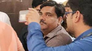 Police personnel take suspended AAP councillor Tahir Hussain into custody after Delhi Court rejected his plea to surrender before it, at Rouse Avenue Court, in New Delhi, Thursday, March 5, 2020.(HT photo) Police personnel take suspended AAP councillor Tahir Hussain into custody after Delhi Court rejected his plea to surrender before it, at Rouse Avenue Court, in New Delhi, Thursday, March 5, 2020.(HT photo)