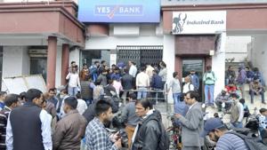 Account holders standing in a queue outside sector 27 Yes Bank Branch, in Noida. (Photo by Sunil Ghosh / Hindustan Times) Account holders standing in a queue outside sector 27 Yes Bank Branch, in Noida. (Photo by Sunil Ghosh / Hindustan Times)