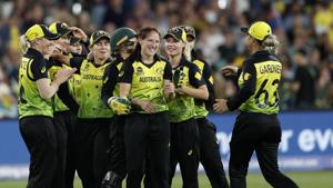 Australia's Megan Schutt, center, is congratulated by teammates after taking the wicket of India's Shikha Pandey during the Women's T20 World Cup cricket final match in Melbourne.(AP) Australia's Megan Schutt, center, is congratulated by teammates after taking the wicket of India's Shikha Pandey during the Women's T20 World Cup cricket final match in Melbourne.(AP)