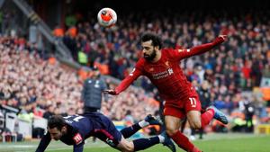 Bournemouth's Adam Smith in action with Liverpool's Mohamed Salah(REUTERS) Bournemouth's Adam Smith in action with Liverpool's Mohamed Salah(REUTERS)