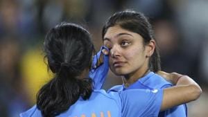 Melbourne: India's Jemimah Rodrigues, left, comforts Smriti Mandhana after their team's loss to Australia in the Women's T20 World Cup cricket final match in Melbourne, Sunday, March 8, 2020. AP/PTI(AP08-03-2020_000155A)(AP) Melbourne: India's Jemimah Rodrigues, left, comforts Smriti Mandhana after their team's loss to Australia in the Women's T20 World Cup cricket final match in Melbourne, Sunday, March 8, 2020. AP/PTI(AP08-03-2020_000155A)(AP)