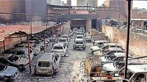 Of the five unidentified bodies, the two in the mortuary at Ram Manohar Lohia Hospital were fished out in a decomposed condition from the drains in the north-east Delhi district, and one in a mortuary of Guru Teg Bahadur Hospital was charred beyond recognition. (HT photo) Of the five unidentified bodies, the two in the mortuary at Ram Manohar Lohia Hospital were fished out in a decomposed condition from the drains in the north-east Delhi district, and one in a mortuary of Guru Teg Bahadur Hospital was charred beyond recognition. (HT photo)