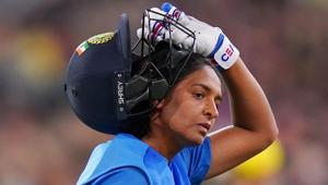 Harmanpreet Kaur of India leaves the field after being dismissed during the Women's T20 World Cup final(REUTERS)