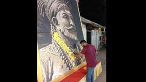 Nitin Dinesh Kamble, set the world record with the mosaic portrait.(Twitter/@ANI) Nitin Dinesh Kamble, set the world record with the mosaic portrait.(Twitter/@ANI)