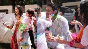 Sunny Leone and husband Daniel Weber during their Holi celebrations. Sunny Leone and husband Daniel Weber during their Holi celebrations.