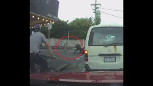 The clip shows the rider thrown off his bike due to the impact.(Facebook/ Dash Cam Owners Australia) The clip shows the rider thrown off his bike due to the impact.(Facebook/ Dash Cam Owners Australia)