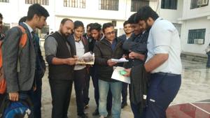 Students of City Montessori School Aliganj Campus 1 discussing their Physical education paper with their teacher on Friday(HT File) Students of City Montessori School Aliganj Campus 1 discussing their Physical education paper with their teacher on Friday(HT File)
