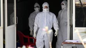Medical officers wearing protective gear outside the Special Isolation Ward for coronavirus patients at a government general hospital in Kochi.(ANI PHOTO.) Medical officers wearing protective gear outside the Special Isolation Ward for coronavirus patients at a government general hospital in Kochi.(ANI PHOTO.)