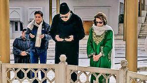 Farooq Abdullah offers prayers at his father Sheikh Abdullah's grave at Hazratbal on the banks of the Dal Lake, in Srinagar on Friday(PTI) Farooq Abdullah offers prayers at his father Sheikh Abdullah's grave at Hazratbal on the banks of the Dal Lake, in Srinagar on Friday(PTI)