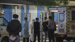 Medical staff stand outside the Pune International airport to take suspected passengers to the hospital, March 14, 2020(Pratham Gokhale/HT Photo) Medical staff stand outside the Pune International airport to take suspected passengers to the hospital, March 14, 2020(Pratham Gokhale/HT Photo)