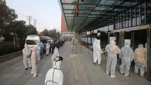 China reported 11 new infections of the coronavirus, , including 4 in Wuhan, on March 14, and for the first time since the start of the epidemic the majority of them were imported cases from overseas.(AFP Photo) China reported 11 new infections of the coronavirus, , including 4 in Wuhan, on March 14, and for the first time since the start of the epidemic the majority of them were imported cases from overseas.(AFP Photo)