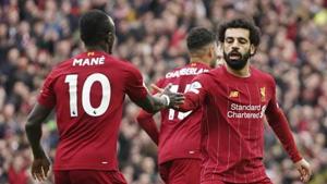 Liverpool's Mohamed Salah, right, celebrates with his teammate Sadio Mane after scoring his side's opening goal.(AP) Liverpool's Mohamed Salah, right, celebrates with his teammate Sadio Mane after scoring his side's opening goal.(AP)