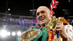 Tyson Fury poses with his belts during a press conference.(REUTERS) Tyson Fury poses with his belts during a press conference.(REUTERS)