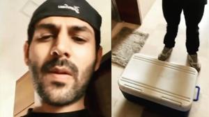 Kartik Aaryan is selling ice-creams sent by Karan Johar for Rs 2 lakh. Kartik Aaryan is selling ice-creams sent by Karan Johar for Rs 2 lakh.