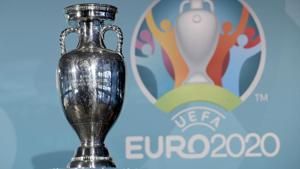 A file photo the Euro soccer championships trophy is seen in front of the logo during the presentation.(AP) A file photo the Euro soccer championships trophy is seen in front of the logo during the presentation.(AP)