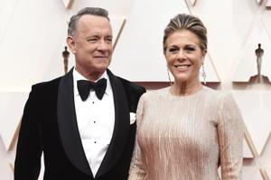 Tom Hanks was in Australia shooting an Elvis Presley biopic directed by Baz Luhrmann. Hanks shared the news about his positive tests on Twitter Wednesday. (Photo by Jordan Strauss/Invision/AP)(Jordan Strauss/Invision/AP) Tom Hanks was in Australia shooting an Elvis Presley biopic directed by Baz Luhrmann. Hanks shared the news about his positive tests on Twitter Wednesday. (Photo by Jordan Strauss/Invision/AP)(Jordan Strauss/Invision/AP)