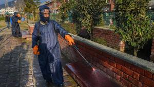 Municipal workers spray disinfectants at a park in Srinagar as a precautionary measure against coronavirus.(PTI) Municipal workers spray disinfectants at a park in Srinagar as a precautionary measure against coronavirus.(PTI)